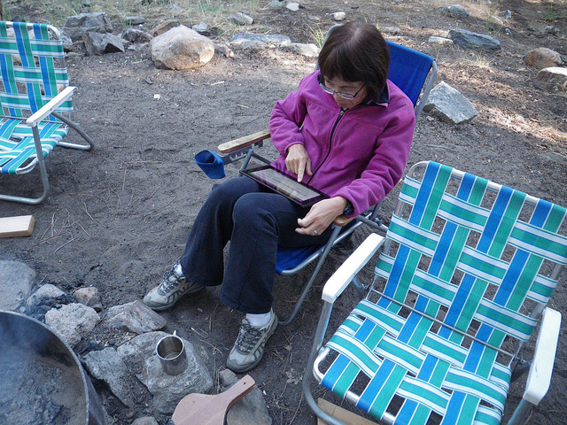 Using tablet on beach by Florian via Flickr