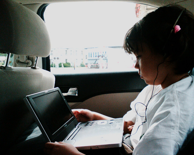 Using Laptop in Car by Eden, Janine and Jim via Flickr