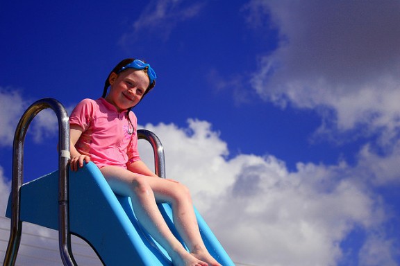 Girl on water slide by Anthony Kelly via Flickr