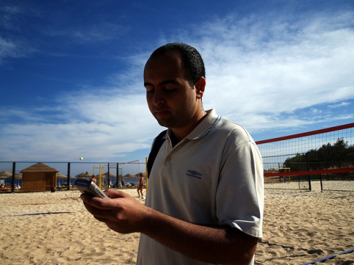 Phone on beach by Tarek via Flickr